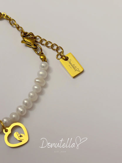 Narukvica s riječnim biserima i tri privjeska